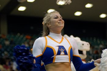 Mar 14, 2008; Katy, TX, USA; UT Arlington Mavericks cheerleader cheers on her team against the Sam Houston Bearkats in the second half of the Southland Conference Tournament at the Merrell Center. Mandatory Credit: Brett Davis-Imagn Images