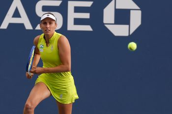 Aug 27, 2025; Flushing, NY, USA; Elise Mertens (BEL) chases a shot against Lulu Sun (NZL) (not pictured) on day four of the 2025 US Open tennis tournament at Billie Jean King USTA National Tennis Center. Mandatory Credit: Geoff Burke-Imagn Images