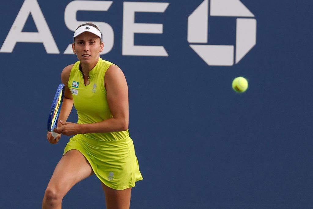 Aug 27, 2025; Flushing, NY, USA; Elise Mertens (BEL) chases a shot against Lulu Sun (NZL) (not pictured) on day four of the 2025 US Open tennis tournament at Billie Jean King USTA National Tennis Center. Mandatory Credit: Geoff Burke-Imagn Images