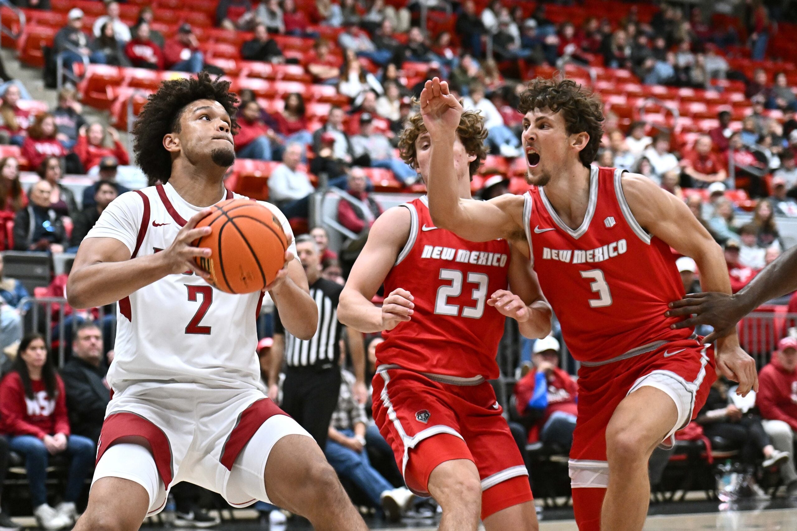 Oct 25, 2025; Pullman, WA, USA; Washington State Cougars forward Eemeli Yalaho (2) shoots the ball against New Mexico Lobos guard Jake Hall (23) in the second half at Friel Court at Beasley Coliseum. Mandatory Credit: James Snook-Imagn Images