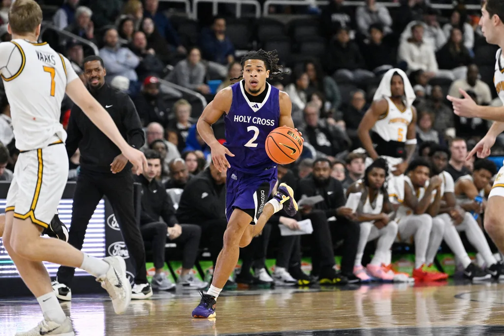 Nov 3, 2025; Providence, Rhode Island, USA; Holy Cross Crusaders guard Deandre Williams (2) dribbles the ball during the second half against the Providence Friars at Amica Mutual Pavilion. Mandatory Credit: Eric Canha-Imagn Images