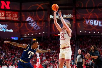 Nov 8, 2025; Lincoln, Nebraska, USA; Nebraska Cornhuskers forward Rienk Mast (51) shoots a three point basket against Florida International Panthers forward Corey Stephenson (3) during the first half at Pinnacle Bank Arena. Mandatory Credit: Dylan Widger-Imagn Images