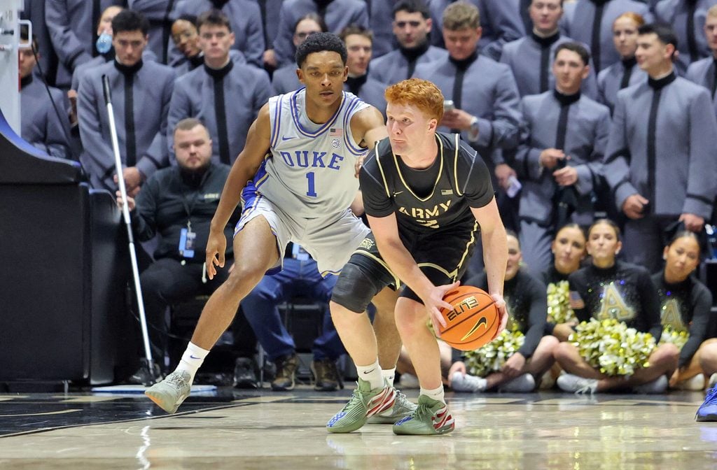 Nov 11, 2025; West Point, New York, USA; Army Black Knights guard Ryan Curry (2) is guarded by Duke Blue Devils guard Caleb Foster (1) during the second half at Christl Arena. Mandatory Credit: Danny Wild-Imagn Images