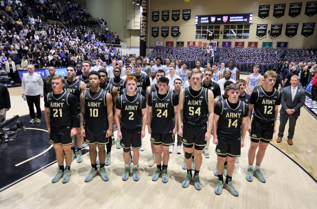 Nov 11, 2025; West Point, New York, USA; The Army Black Knights and Duke Blue Devils stand together for the West Point alma mater after Duke beat Army 114-59 on a night that honored former Duke Blue Devils head coach Mike Krzyzewski at Christl Arena. Mandatory Credit: Danny Wild-Imagn Images