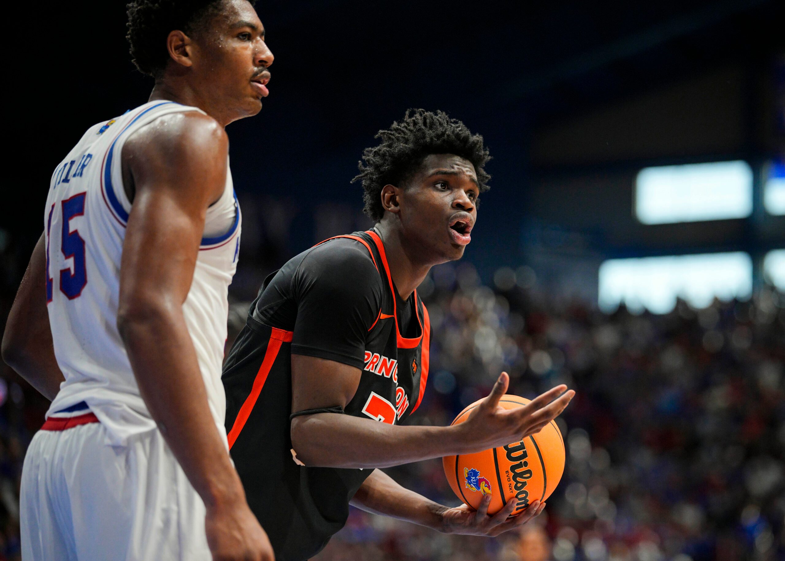 Nov 15, 2025; Lawrence, Kansas, USA; Princeton Tigers forward Malik Abdullahi (7) reacts after a foul call during the second half against the Kansas Jayhawks at Allen Fieldhouse. Mandatory Credit: Jay Biggerstaff-Imagn Images