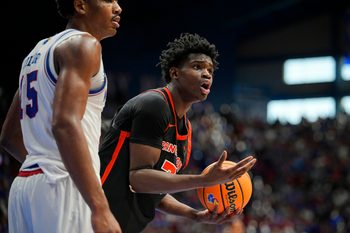 Nov 15, 2025; Lawrence, Kansas, USA; Princeton Tigers forward Malik Abdullahi (7) reacts after a foul call during the second half against the Kansas Jayhawks at Allen Fieldhouse. Mandatory Credit: Jay Biggerstaff-Imagn Images