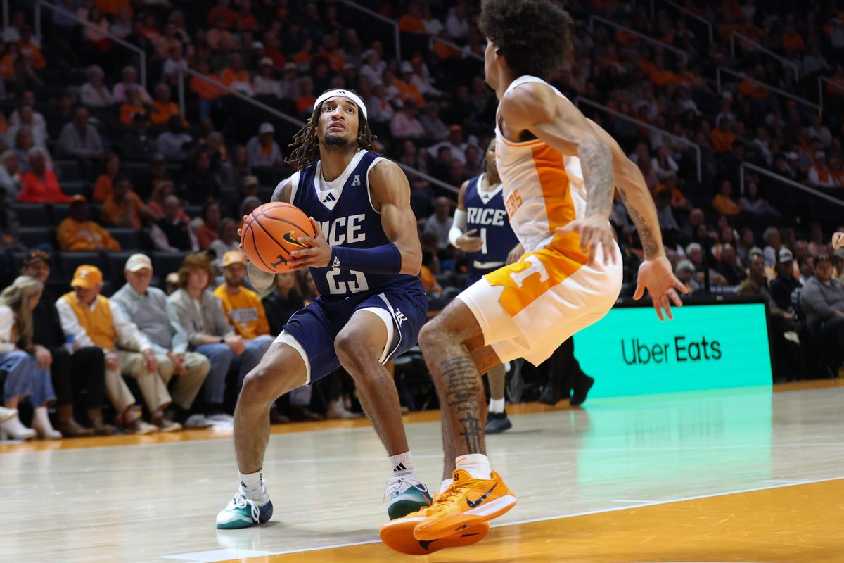 Nov 17, 2025; Knoxville, Tennessee, USA; Rice Owls guard Nick Anderson (23) moves the ball against the Tennessee Volunteers during the second half at Thompson-Boling Arena at Food City Center. Mandatory Credit: Randy Sartin-Imagn Images