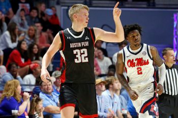 Nov 18, 2025; Oxford, Mississippi, USA; Austin Peay Governors forward Collin Parker (32) reacts after a three point basket during the second half against the Mississippi Rebels at The Sandy and John Black Pavilion at Ole Miss. Mandatory Credit: Petre Thomas-Imagn Images