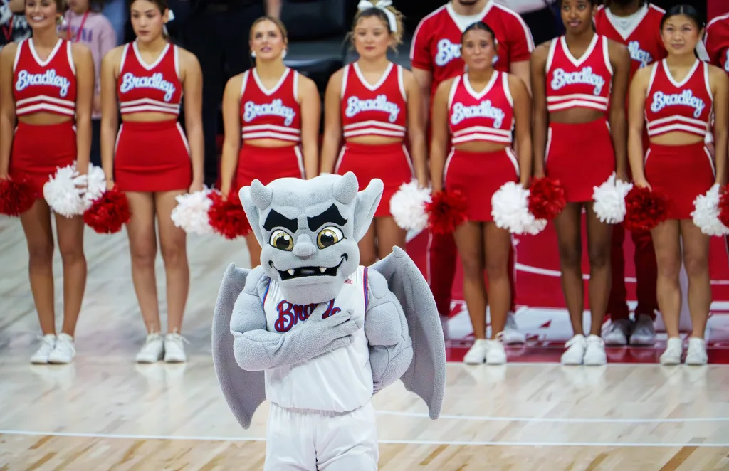 Bradley mascot Kaboom! stands with the cheerleaders for the national anthem before the start of their college basketball game against UMass Lowell on Wednesday, Nov. 19, 2025 at Carver Arena in Peoria. The Braves rallied to defeat the River Hawks 87-77.