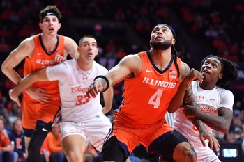 Nov 24, 2025; Champaign, Illinois, USA;  Illinois Fighting Illini guard Kylan Boswell (4) and UT Rio Grande Valley Vaqueros guard Jaylen Washington (0) wrestle for position under the basket during the first half at State Farm Center. Mandatory Credit: Ron Johnson-Imagn Images