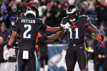 Nov 28, 2025; Philadelphia, Pennsylvania, USA; Philadelphia Eagles wide receiver A.J. Brown (11) celebrates a touchdown against the Chicago Bears with wide receiver Jahan Dotson (2) during the third quarter of the game at Lincoln Financial Field. Mandatory Credit: Bill Streicher-Imagn Images