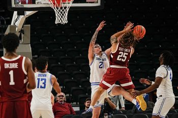 Jeremy Dent-Smith, 25, of Stanford shoots over Robbie Avila, 21, of St. Louis University in the Acrisure Invitational Champioship game at Acrisure Arena in Palm Desert, Calif., Nov. 28, 2025.
