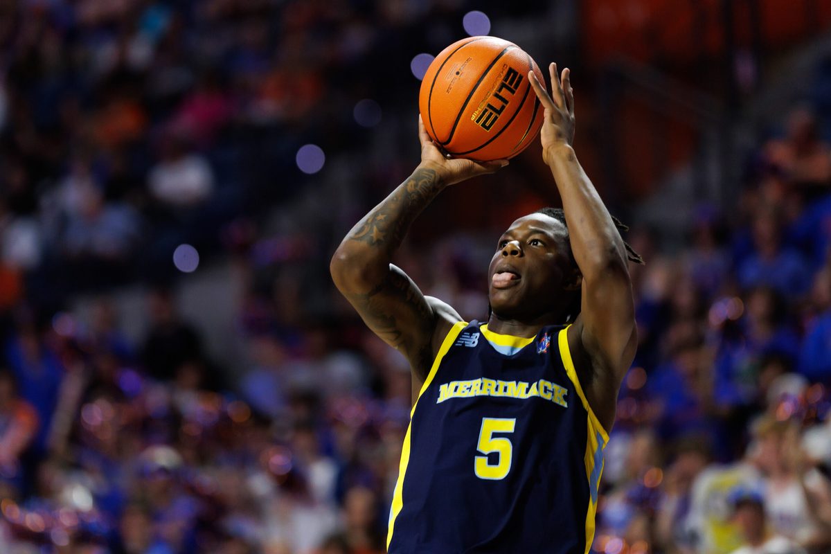 Nov 21, 2025; Gainesville, Florida, USA; Merrimack Warriors guard Kevair Kennedy (5) shoots the ball against the Florida Gators during the first half at Exactech Arena at the Stephen C. O'Connell Center. Mandatory Credit: Matt Pendleton-Imagn Images