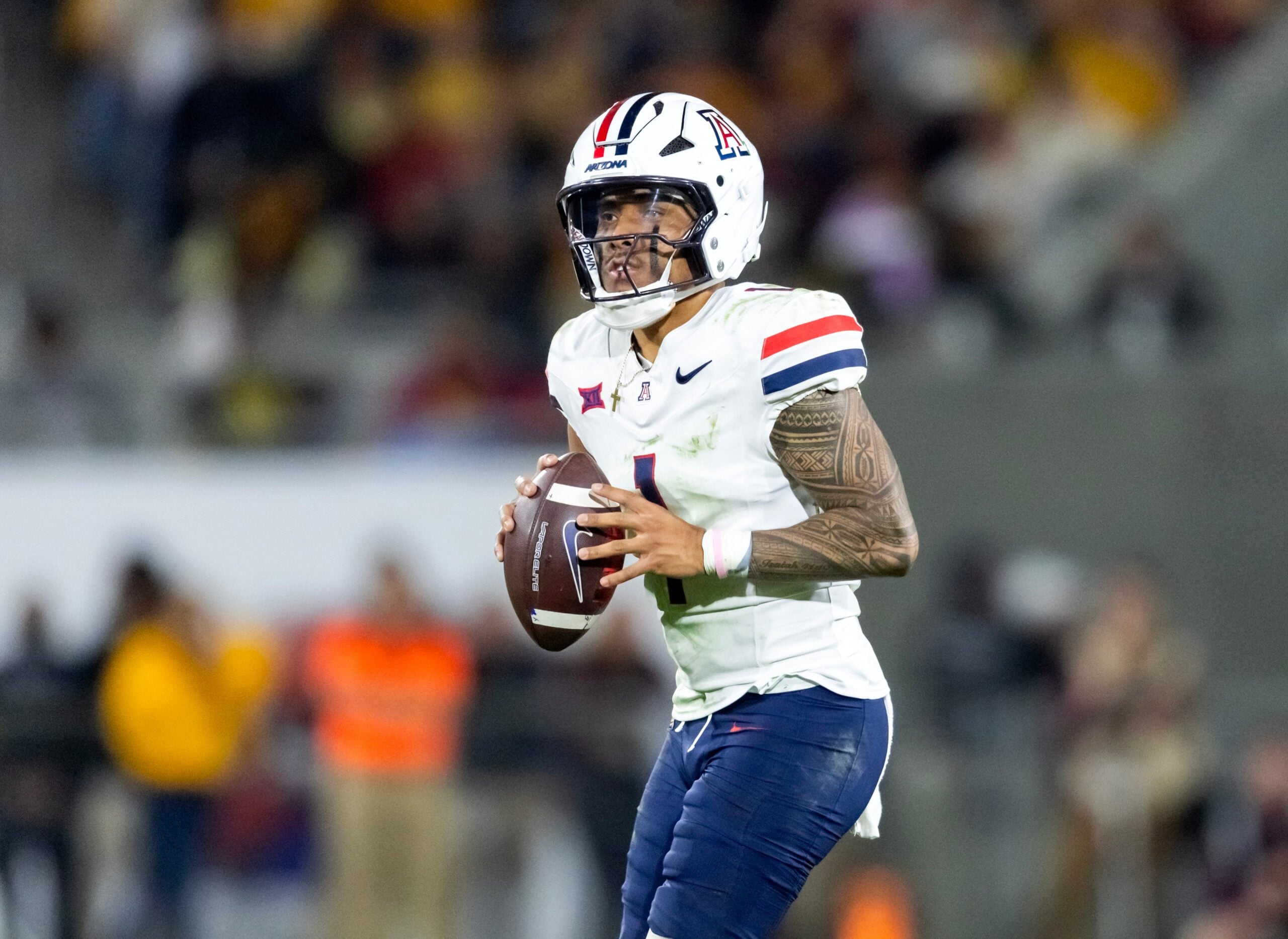 Nov 28, 2025; Tempe, Arizona, USA; Arizona Wildcats quarterback Noah Fifita (1) against the Arizona State Sun Devils during the 99th Territorial Cup at Mountain America Stadium. Mandatory Credit: Mark J. Rebilas-Imagn Images