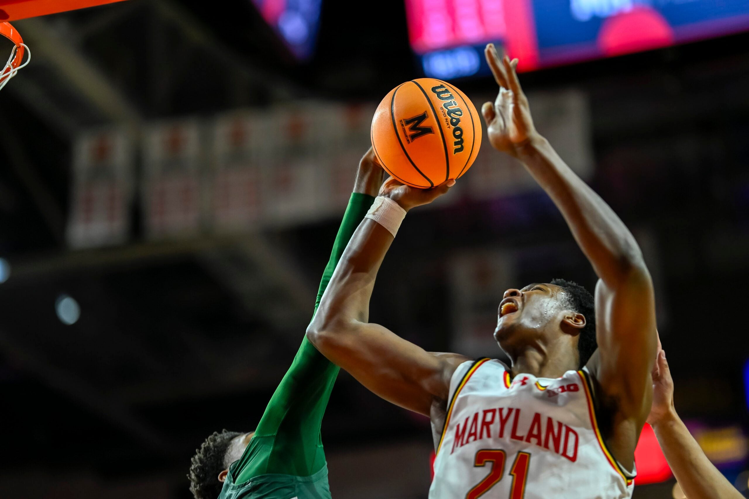 Dec 2, 2025; College Park, Maryland, USA;  Maryland Terrapins forward Pharrel Payne (21) reacts while shooting during the second half against the Wagner Seahawks at Xfinity Center. Mandatory Credit: Tommy Gilligan-Imagn Images