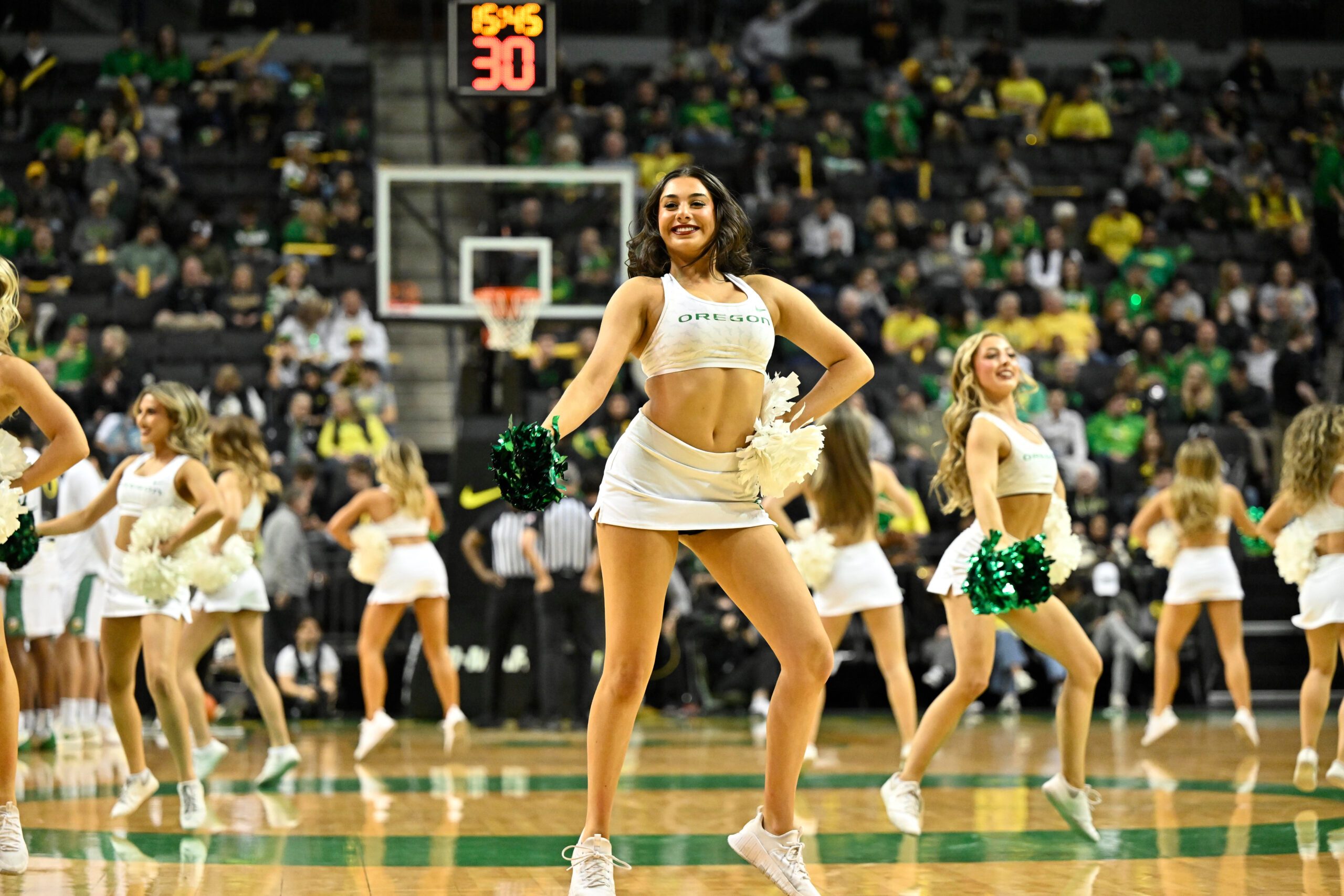 Dec 2, 2025; Eugene, Oregon, USA; The Oregon Ducks cheerleaders perform during the second half against the Southern California Trojans at Matthew Knight Arena. Mandatory Credit: Craig Strobeck-Imagn Images