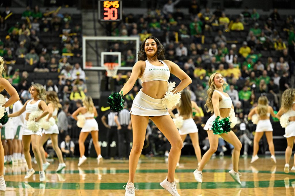 Dec 2, 2025; Eugene, Oregon, USA; The Oregon Ducks cheerleaders perform during the second half against the Southern California Trojans at Matthew Knight Arena. Mandatory Credit: Craig Strobeck-Imagn Images