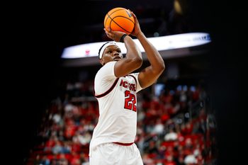 Dec 6, 2025; Raleigh, North Carolina, USA; NC State Wolfpack forward Ven-Allen Lubin (22) shoots a free throw during the first half of the game against UNC Asheville Bulldogs at Lenovo Center. Mandatory Credit: Jaylynn Nash-Imagn Images