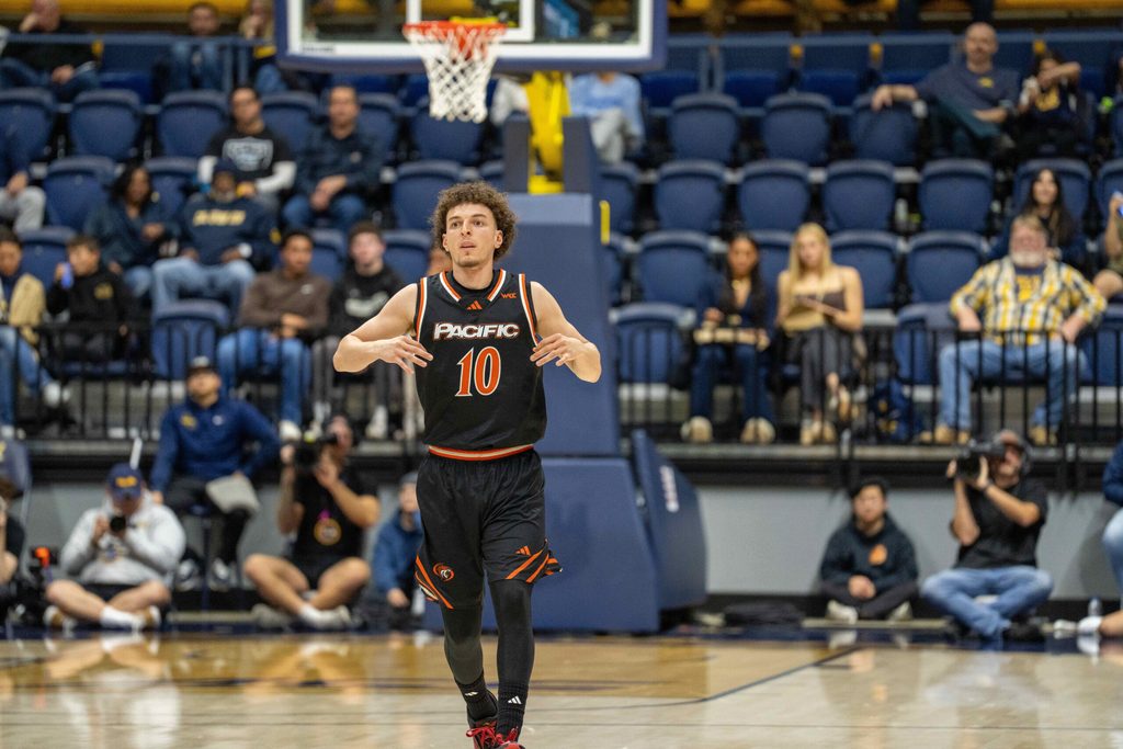 Dec 6, 2025; Berkeley, California, USA; Pacific Tigers guard TJ Wainwright (10) celebrates a three point basket against the California Golden Bears during the second half at Haas Pavilion. Mandatory Credit: Neville E. Guard-Imagn Images