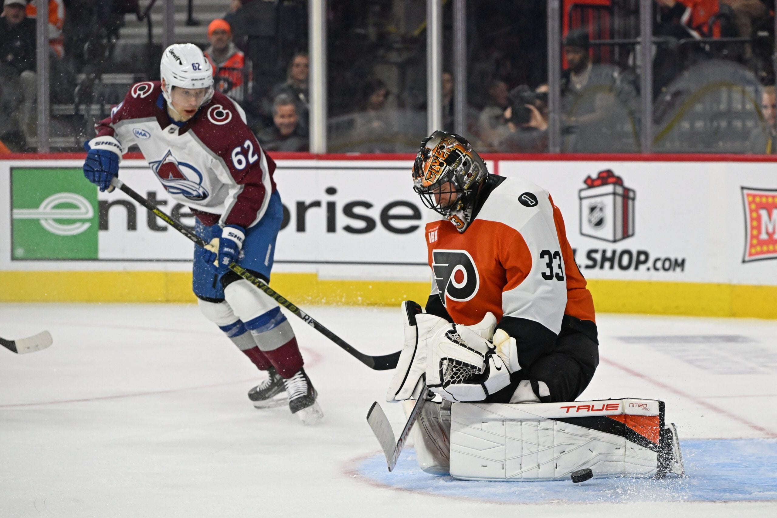 Dec 7, 2025; Philadelphia, Pennsylvania, USA; Philadelphia Flyers goaltender Samuel Ersson (33) makes a save against the Colorado Avalanche during the first period at Xfinity Mobile Arena. Mandatory Credit: Eric Hartline-Imagn Images