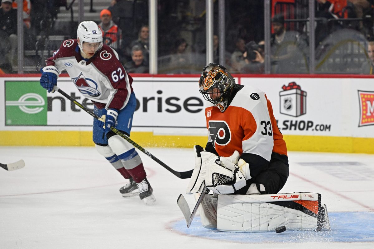 Dec 7, 2025; Philadelphia, Pennsylvania, USA; Philadelphia Flyers goaltender Samuel Ersson (33) makes a save against the Colorado Avalanche during the first period at Xfinity Mobile Arena. Mandatory Credit: Eric Hartline-Imagn Images