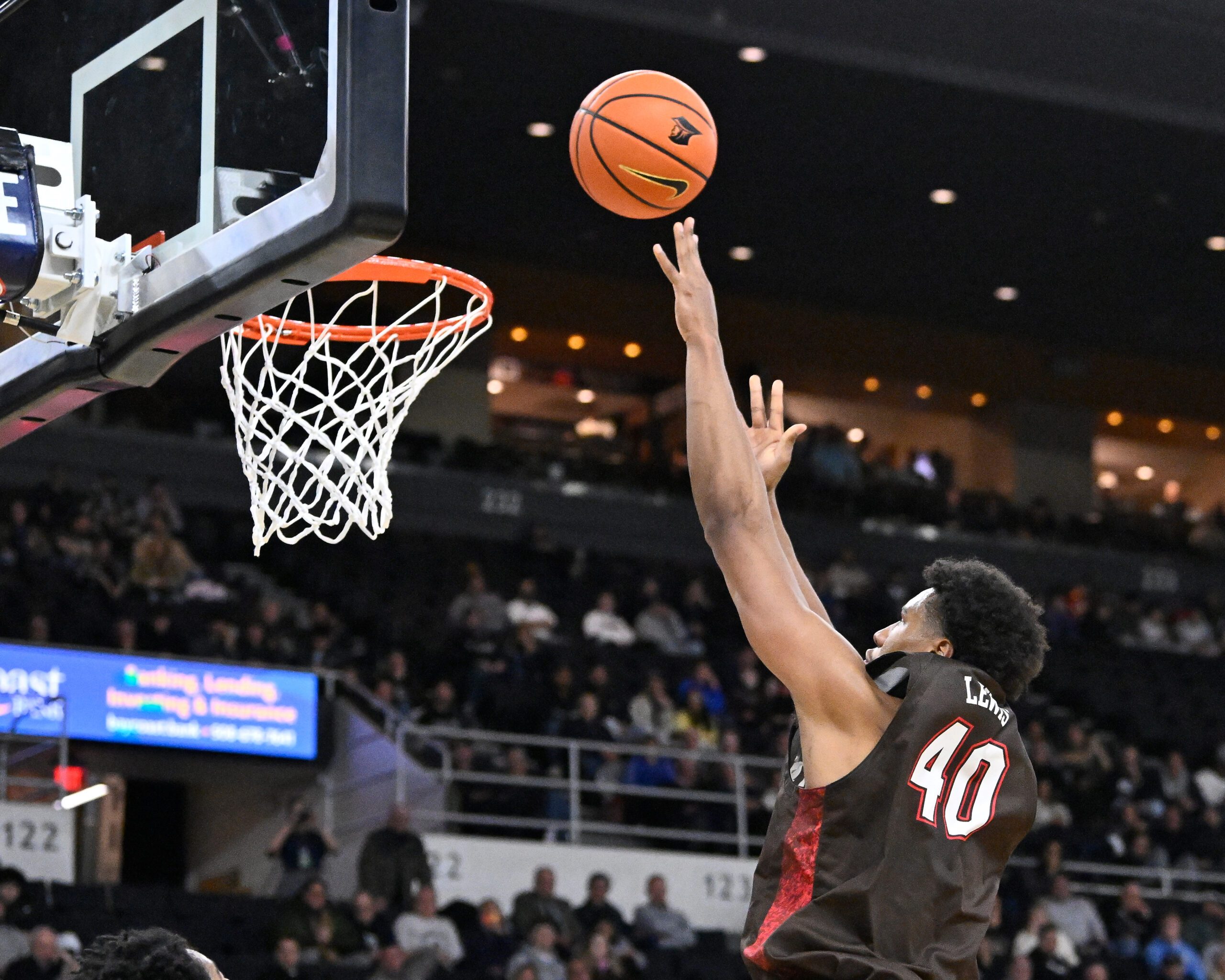 Dec 9, 2025; Providence, Rhode Island, USA; Brown Bears forward Landon Lewis (40) shoots the ball during the second half against the Providence Friars at Amica Mutual Pavilion. Mandatory Credit: Eric Canha-Imagn Images