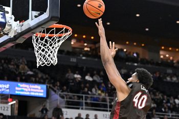 Dec 9, 2025; Providence, Rhode Island, USA; Brown Bears forward Landon Lewis (40) shoots the ball during the second half against the Providence Friars at Amica Mutual Pavilion. Mandatory Credit: Eric Canha-Imagn Images