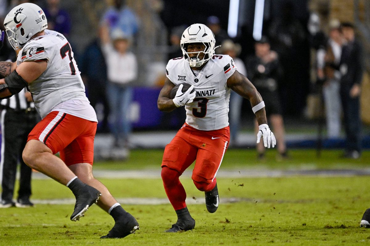 Nov 29, 2025; Fort Worth, Texas, USA; Cincinnati Bearcats running back Tawee Walker (3) runs with the ball during the game between the Horned Frogs and the Bearcats at Amon G. Carter Stadium. Mandatory Credit: Jerome Miron-Imagn Images