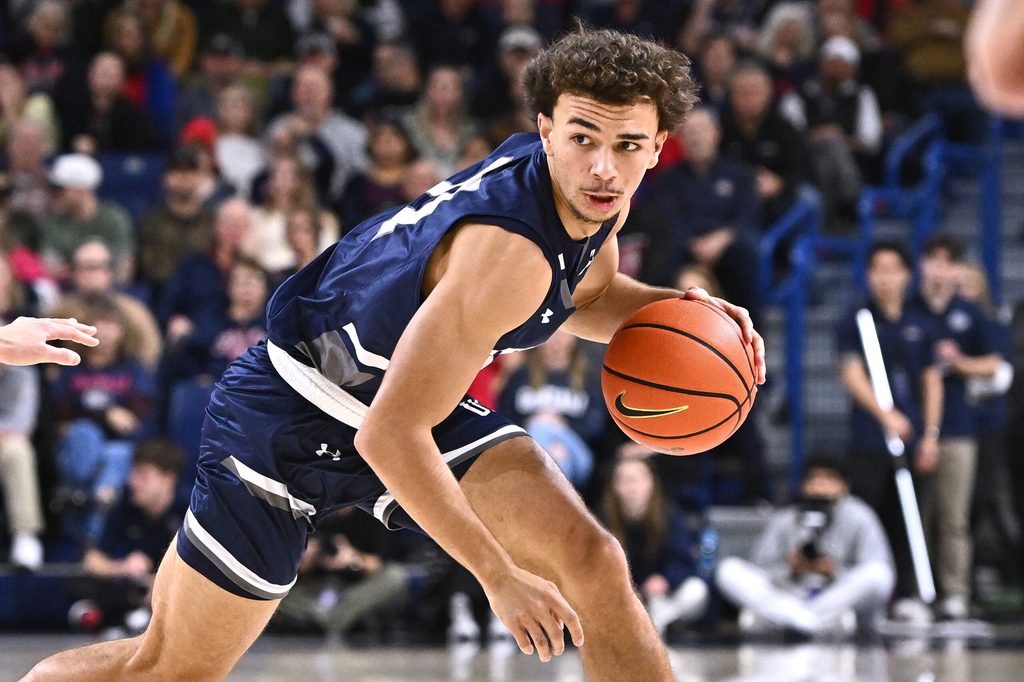 Dec 7, 2025; Spokane, Washington, USA; North Florida Ospreys guard Kamrin Oriol (11) controls the ball against the Gonzaga Bulldogs in the first half at McCarthey Athletic Center. Mandatory Credit: James Snook-Imagn Images
