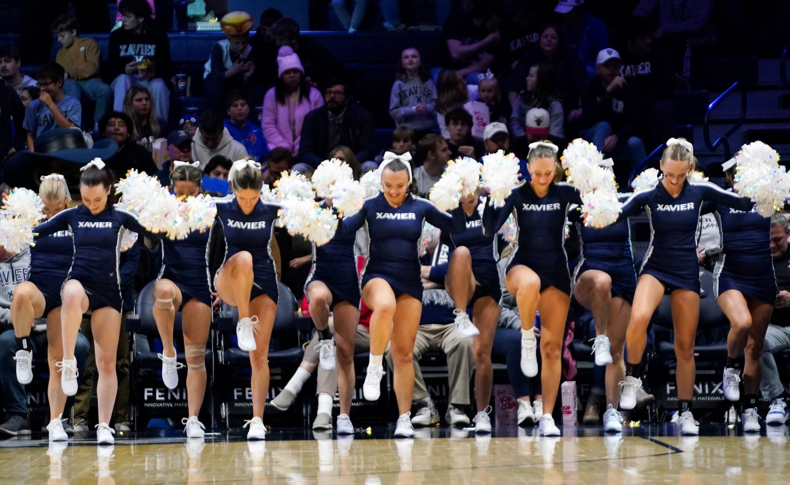 Xavier Musketeers cheerleaders perform a routine in the second half of a NCAA men’s basketball game between the Xavier Musketeers and Missouri State Bears, Friday, Dec. 12, 2025, at Cintas Center in Cincinnati. Musketeers won 75-57.