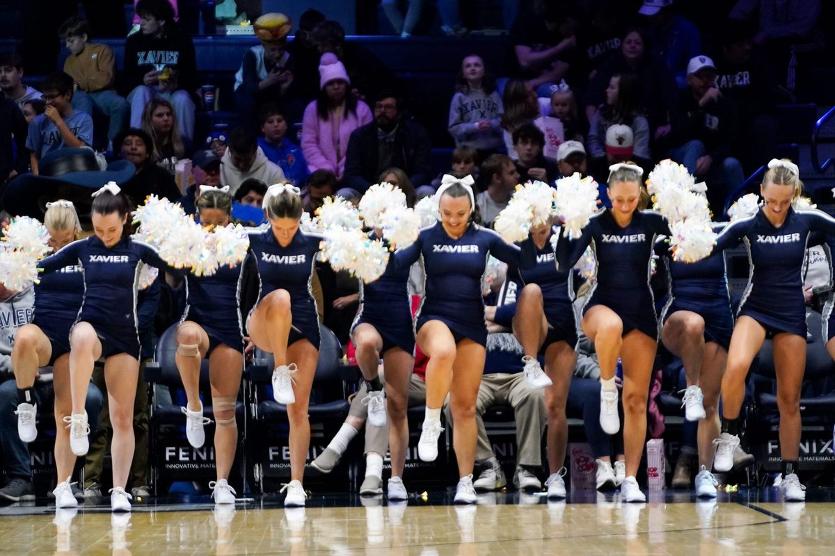 Xavier Musketeers cheerleaders perform a routine in the second half of a NCAA men’s basketball game between the Xavier Musketeers and Missouri State Bears, Friday, Dec. 12, 2025, at Cintas Center in Cincinnati. Musketeers won 75-57.