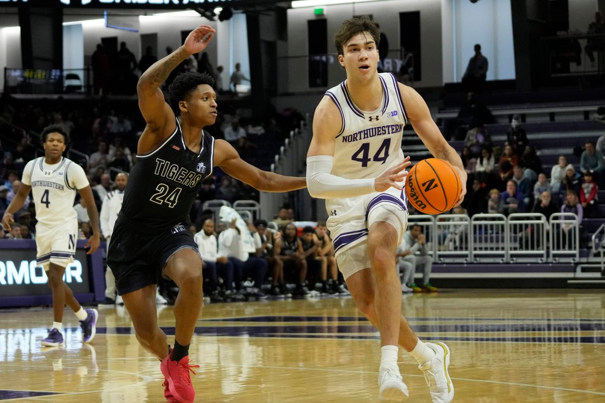 Dec 13, 2025; Evanston, Illinois, USA; Jackson State Tigers guard Daeshun Ruffin (24) defends Northwestern Wildcats guard Angelo Ciaravino (44) during the second half at Welsh-Ryan Arena. Mandatory Credit: David Banks-Imagn Images