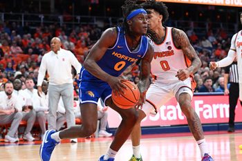Dec 13, 2025; Syracuse, New York, USA; Hofstra Pride guard Biggie Patterson (0) drives in the first half against the Syracuse Orange at the JMA Wireless Dome. Mandatory Credit: Mark Konezny-Imagn Images