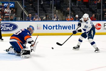 Dec 13, 2025; Elmont, New York, USA; New York Islanders goaltender Ilya Sorokin (30) makes a save on Tampa Bay Lightning right wing Nikita Kucherov (86) during shoot outs at UBS Arena. Mandatory Credit: Dennis Schneidler-Imagn Images