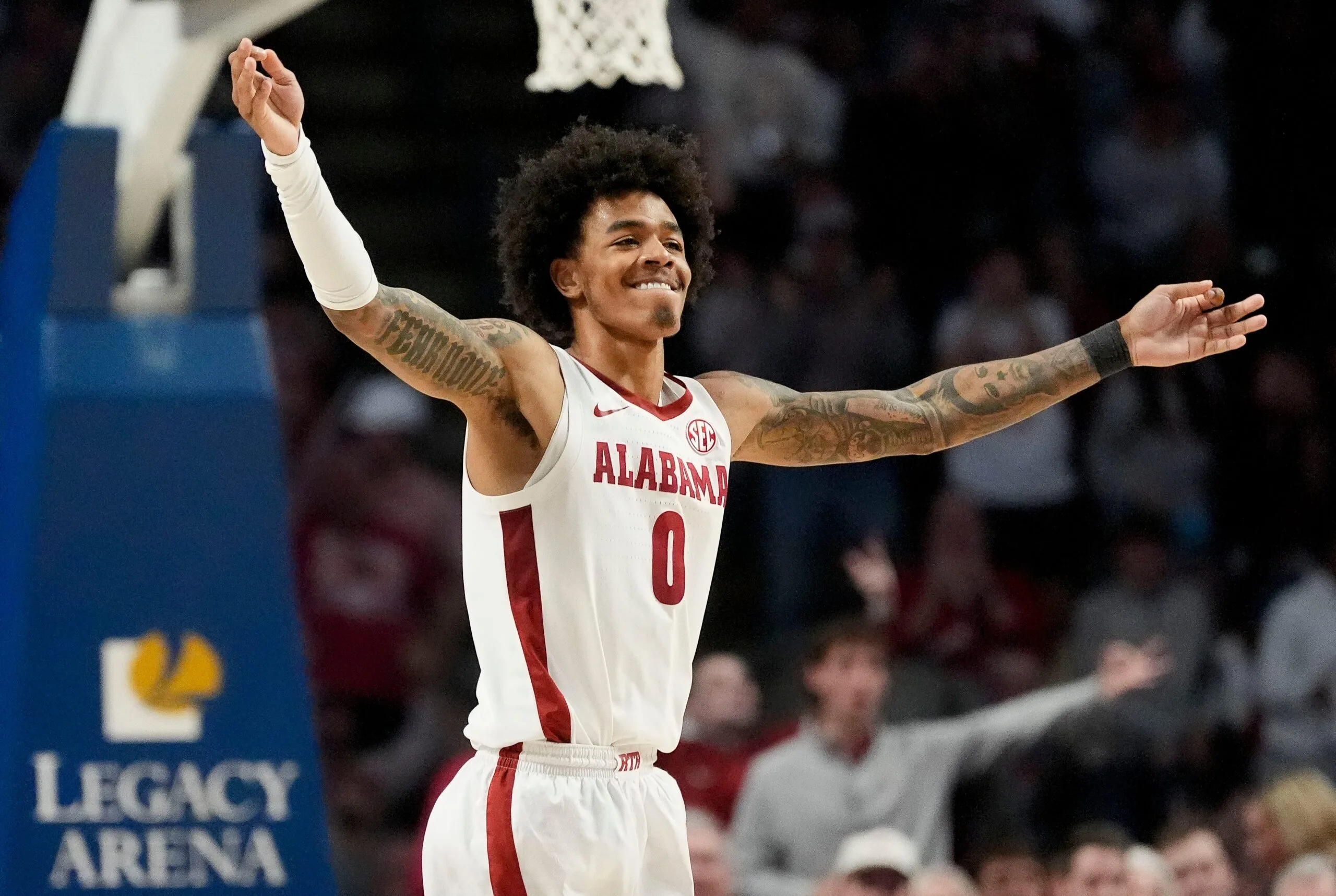 Dec 13, 2025; Birmingham, AL, USA; Alabama guard Labaron Philon Jr. (0) celebrates a three pointer against Arizona at Legacy Arena. Mandatory Credit: Gary Cosby Jr.-Tuscaloosa News
