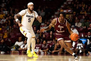 Dec 14, 2025; Minneapolis, Minnesota, USA; Texas Southern Tigers guard Zaire Hayes (7) works around Minnesota Golden Gophers forward Jaylen Crocker-Johnson (5) during the second half at Williams Arena. Mandatory Credit: Matt Krohn-Imagn Images
