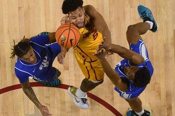 Iowa State Cyclones forward Joshua Jefferson (5) shoots the ball over the ball between Eastern Illinois Panthers guard Zion Fruster (5) and forward Naz Fisher (13) during the second half on December 14, 2025, at Hilton Coliseum in Ames, Iowa.