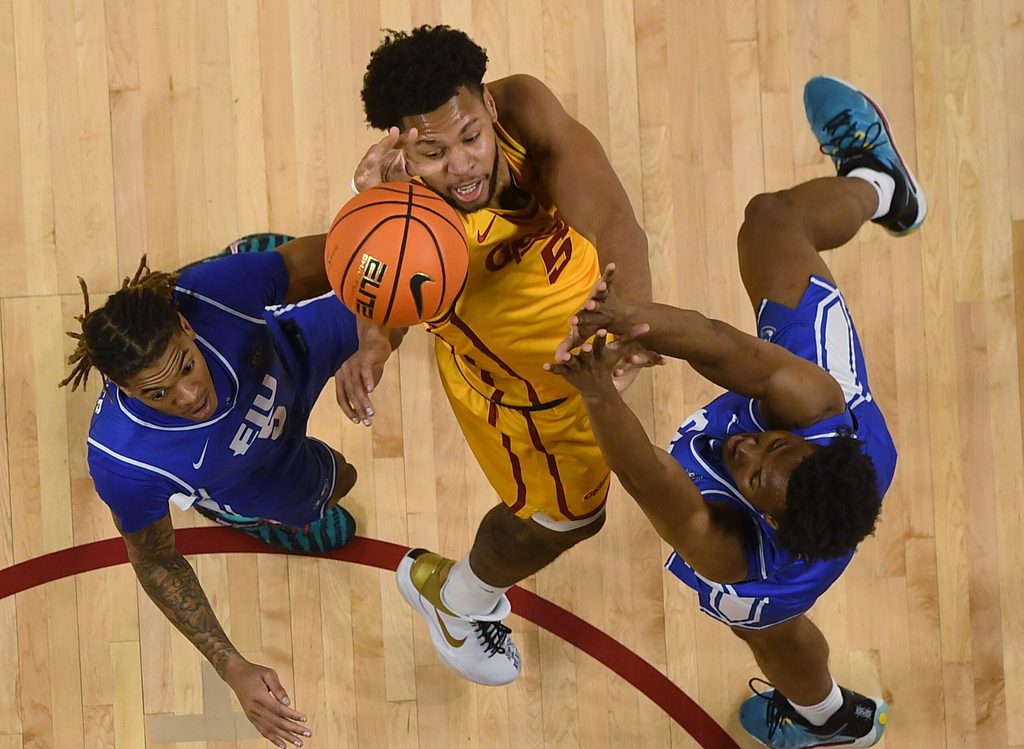 Iowa State Cyclones forward Joshua Jefferson (5) shoots the ball over the ball between Eastern Illinois Panthers guard Zion Fruster (5) and forward Naz Fisher (13) during the second half on December 14, 2025, at Hilton Coliseum in Ames, Iowa.