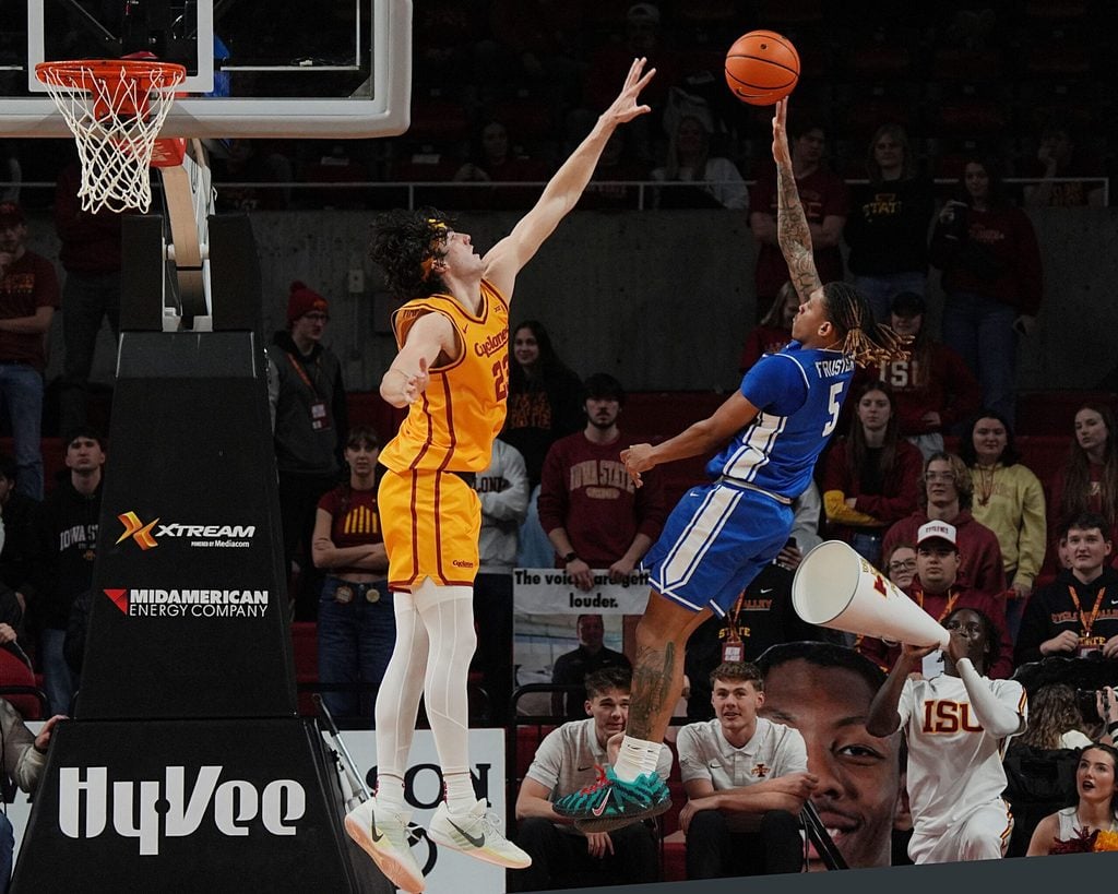 Iowa State Cyclones forward Blake Buchanan (23) attempts to block the ball as Eastern Illinois Panthers guard Zion Fruster (5) shoots during the second half on December 14, 2025, at Hilton Coliseum in Ames, Iowa.