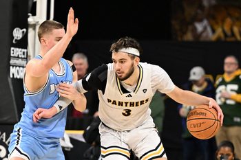 UW-Milwaukee forward Danilo Jovanovich (3) looks for a way around the defense of Indiana State guard Jo Van Buggenhout (6) in a game Sunday, December 14, 2025, at the UWM Panther Arena in Milwaukee, Wisconsin.