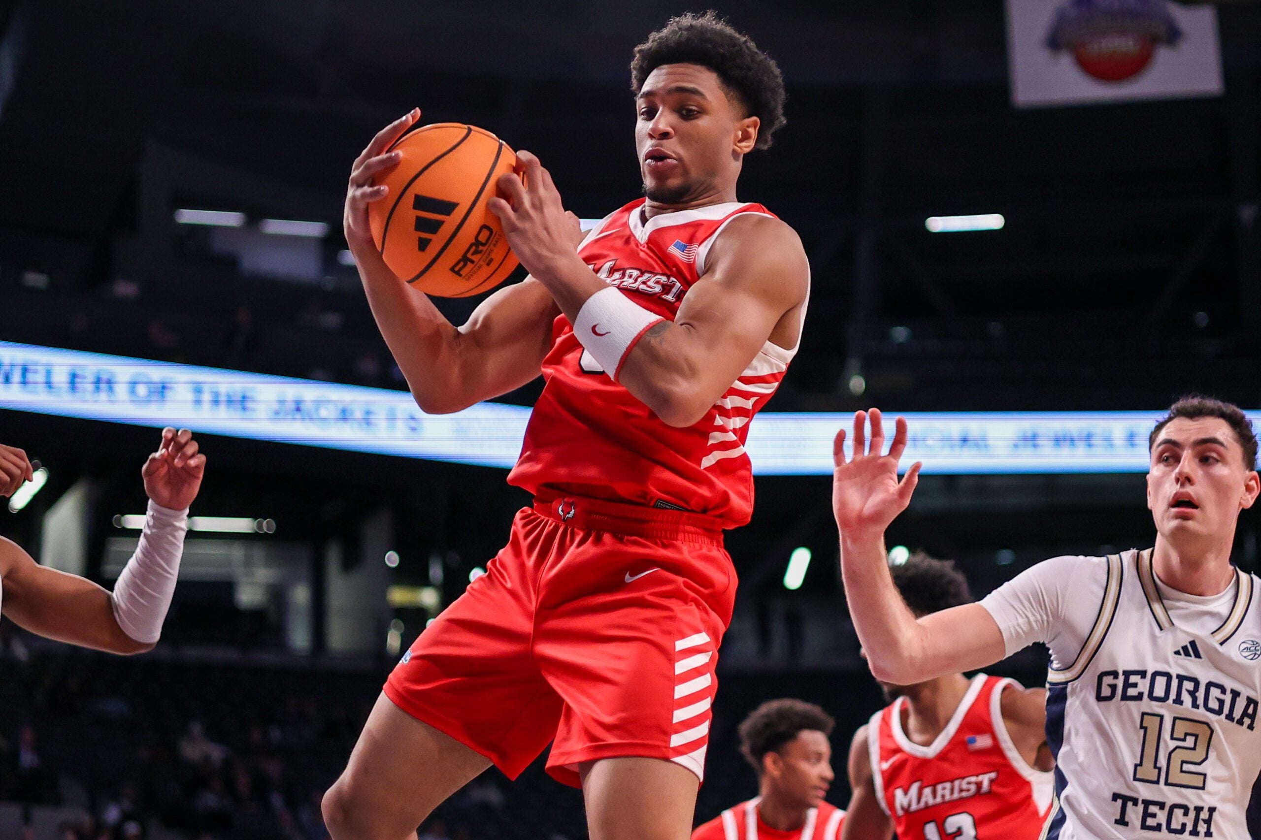 Dec 16, 2025; Atlanta, Georgia, USA; Marist Red Foxes guard Jadin Collins-Roberts (0) grabs a rebound against the Georgia Tech Yellow Jackets in the second half at McCamish Pavilion. Mandatory Credit: Brett Davis-Imagn Images