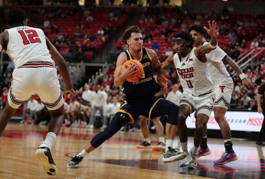 Dec 16, 2025; Lubbock, Texas, USA; Northern Colorado Bears guard Zach Bloch (8) drives to the paint against Texas Tech Red Raiders guard Jaylen Petty (11) in the second half at United Supermarkets Arena. Mandatory Credit: Michael C. Johnson-Imagn Images