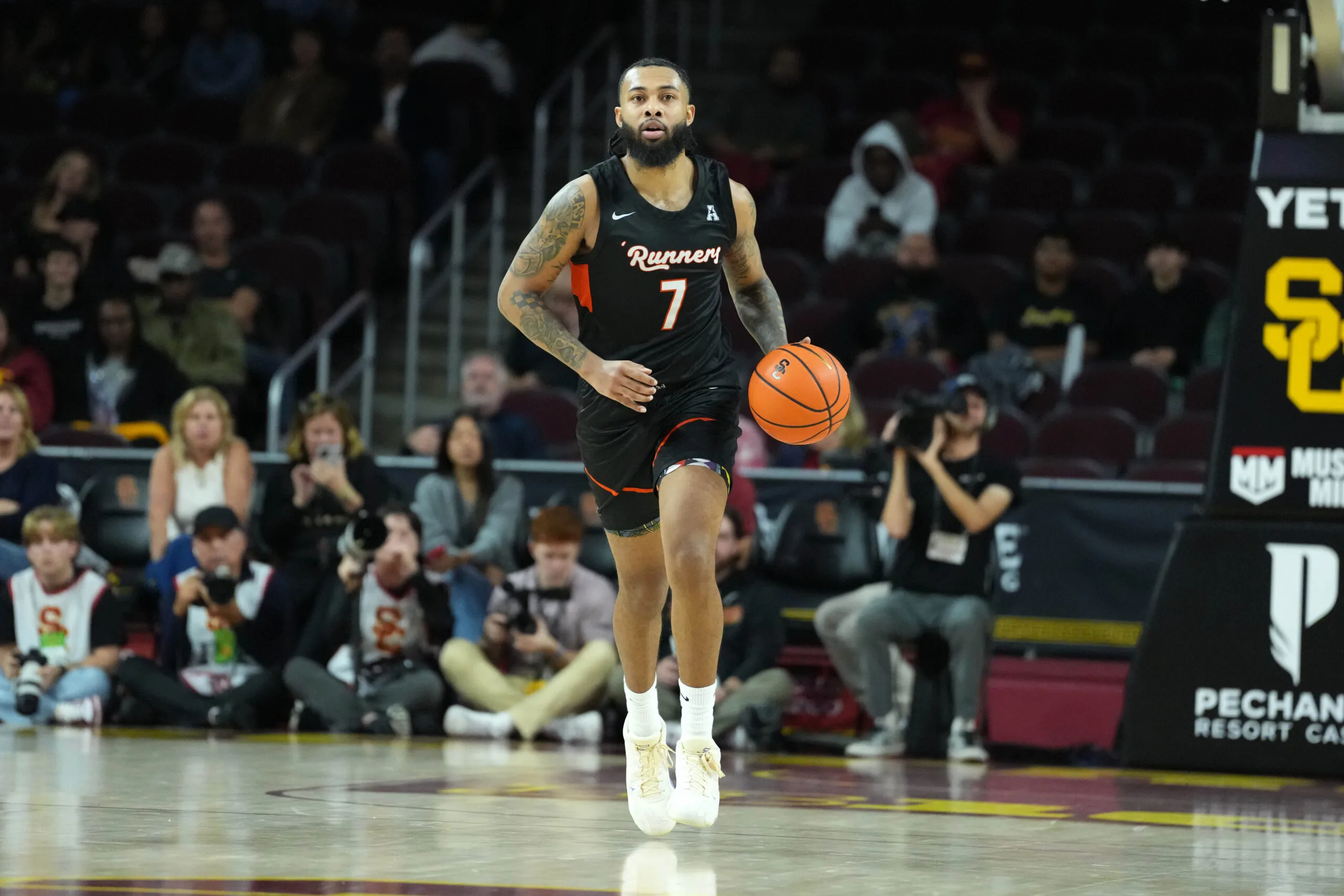 Dec 17, 2025; Los Angeles, California, USA; UTSA Roadrunners guard Jamir Simpson (7) dribbles the ball against the Southern California Trojans in the second half at Galen Center. Mandatory Credit: Kirby Lee-Imagn Images