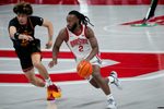 Ohio State Buckeyes guard Bruce Thornton (2) dribbles the ball against Grambling State Tigers forward Antonio Munoz (15) in the second half of the NCAA men’s basketball game Value City Arena on Tuesday, Dec. 23, 2025 in Columbus, Ohio.