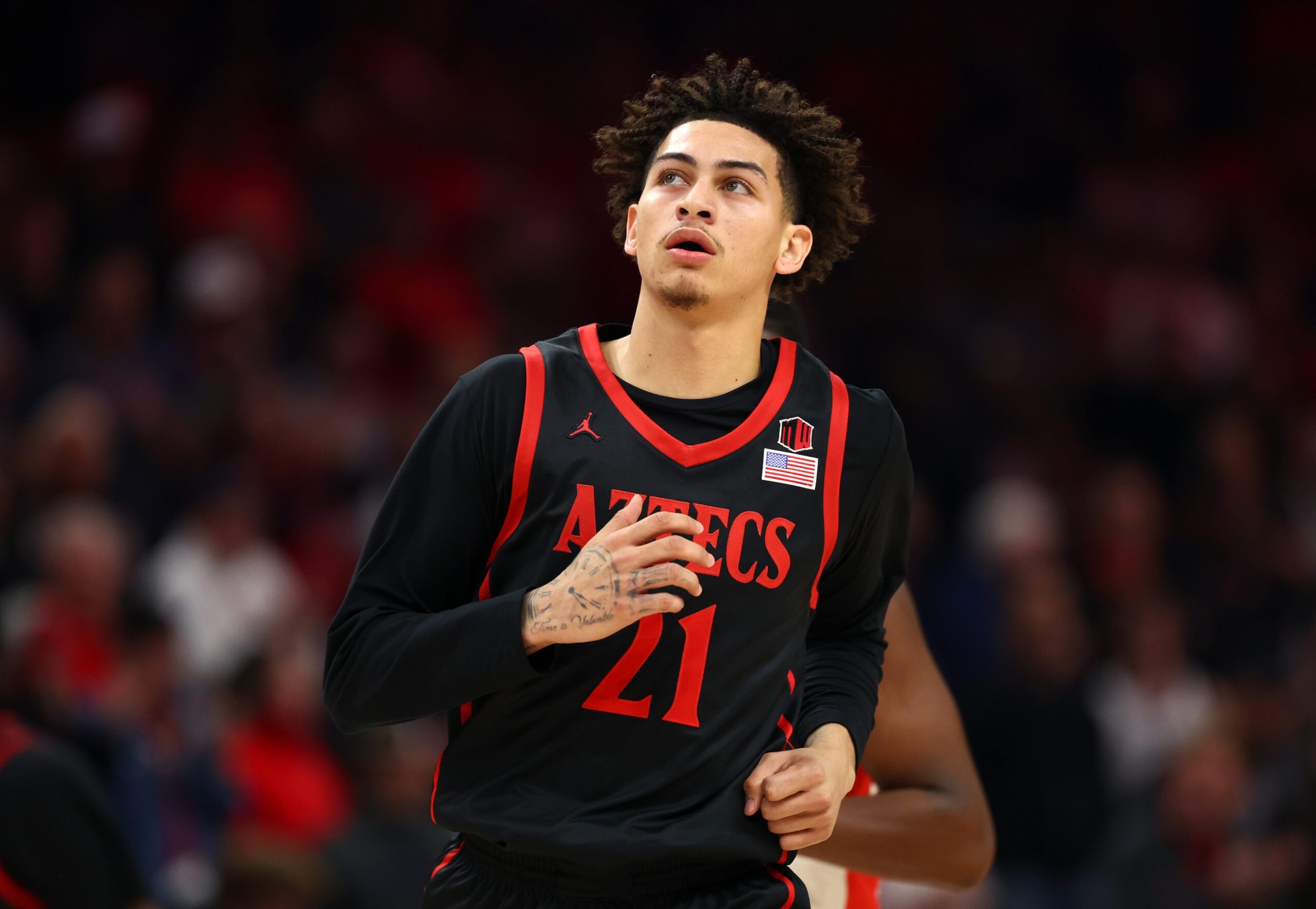 Dec 20, 2025; Phoenix, Arizona, USA; San Diego State Aztecs guard Miles Byrd (21) against the Arizona Wildcats during the Hall of Fame Series at Mortgage Matchup Center. Mandatory Credit: Mark J. Rebilas-Imagn Images