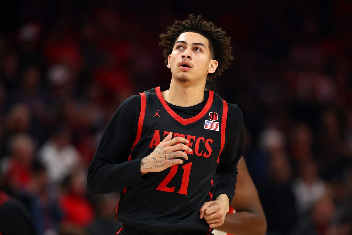 Dec 20, 2025; Phoenix, Arizona, USA; San Diego State Aztecs guard Miles Byrd (21) against the Arizona Wildcats during the Hall of Fame Series at Mortgage Matchup Center. Mandatory Credit: Mark J. Rebilas-Imagn Images