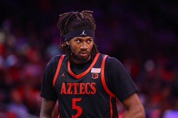 Dec 20, 2025; Phoenix, Arizona, USA; San Diego State Aztecs forward Pharaoh Compton (5) against the Arizona Wildcats during the Hall of Fame Series at Mortgage Matchup Center. Mandatory Credit: Mark J. Rebilas-Imagn Images