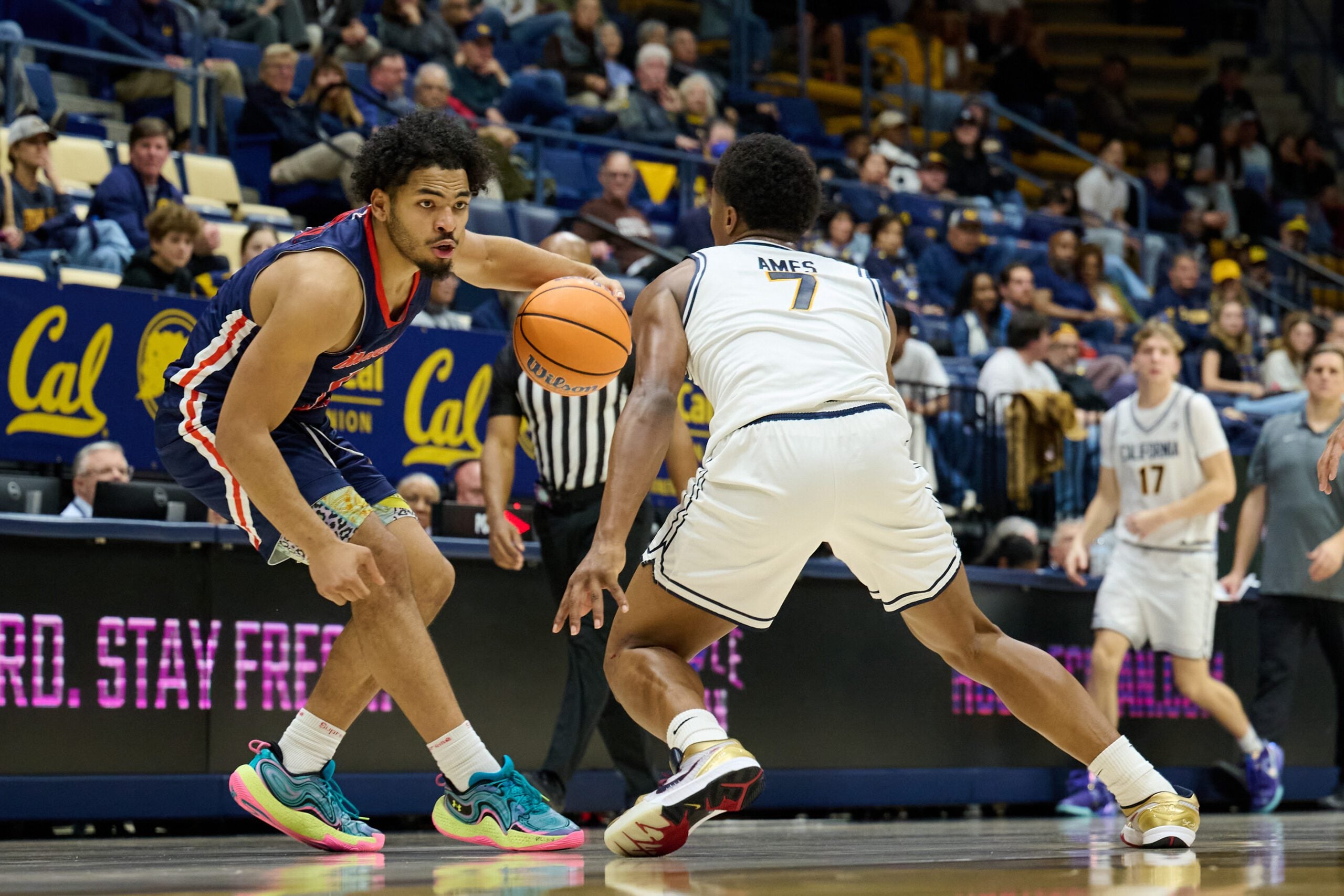 Dec 19, 2025; Berkeley, California, USA; Morgan State Bears guard Alfred Worrell Jr. (1) dribbles the ball against California Golden Bears guard Dai Dai Ames (7) during the second half at Haas Pavilion. Mandatory Credit: Robert Edwards-Imagn Images