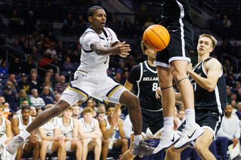 Notre Dame guard Markus Burton, left, passes the ball during a NCAA men's basketball game against Bellarmine at Purcell Pavilion on Wednesday, Nov. 19, 2025, in South Bend.