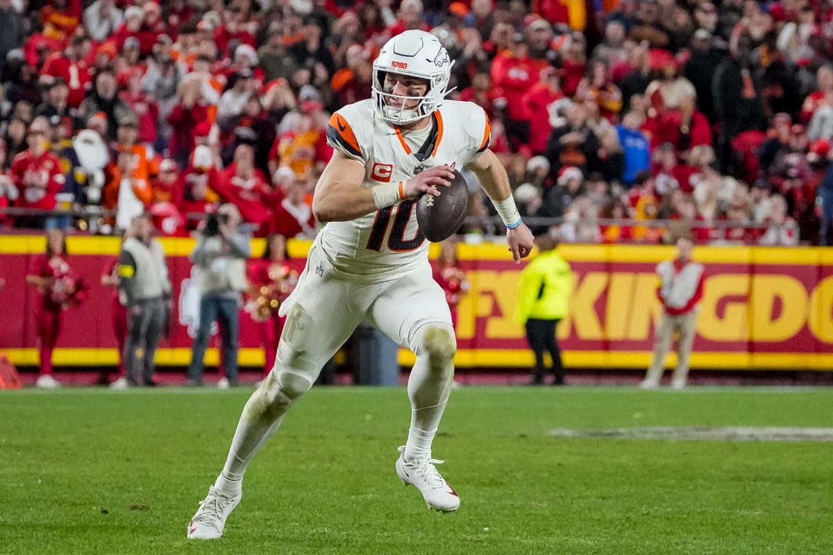 Dec 25, 2025; Kansas City, Missouri, USA; Denver Broncos quarterback Bo Nix (10) runs the ball during the fourth quarter at GEHA Field at Arrowhead Stadium. Mandatory Credit: Denny Medley-Imagn Images